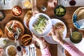 Mexican Tacos and traditional food and people hands over table top view, cuisine in Mexico Latin America