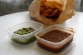 Mexican takeaway: Nachos, Salsa and Guacamole Royalty Free Stock Photo