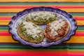 Mexican tlacoyos with green and red sauce, Traditional food in Mexico