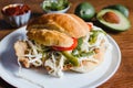 Mexican torta is chicken milanese sandwich with avocado, chili chipotle and oaxaca cheese Royalty Free Stock Photo