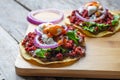 Mexican tortilla toast with chorizo also called tostadas