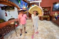 Mexican tourists with ponchos and sombreros 36