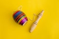 Mexican toys, Balero from Wooden in Mexico on yellow background Royalty Free Stock Photo