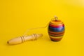 Mexican toys, Balero from Wooden in Mexico on yellow background Royalty Free Stock Photo
