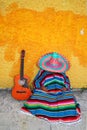 Mexican typical lazy man hat guitar serape