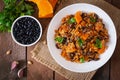 Mexican vegan vegetable pilaf with haricot beans and pumpkin Royalty Free Stock Photo