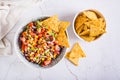 Mexican vegetable salad cowboy caviar and nachos in a bowl on the table. Top view Royalty Free Stock Photo