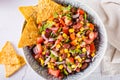 Mexican vegetable salad cowboy caviar and nachos in a bowl on the table. Top view. Closeup Royalty Free Stock Photo