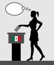 Mexican voter young woman voting for election in Mexico with tho