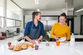 Mexican woman baking bread called pan de muerto traditional from Mexico in Halloween