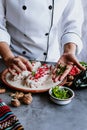 Mexican woman chef cooking chiles en nogada recipe with Poblano chili and ingredients, traditional dish in Puebla Mexico Royalty Free Stock Photo