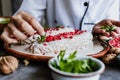 Mexican woman chef cooking chiles en nogada recipe with Poblano chili and ingredients, traditional dish in Puebla Mexico Royalty Free Stock Photo