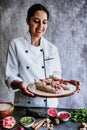 Mexican woman chef cooking chiles en nogada recipe with Poblano chili and ingredients, traditional dish in Puebla Mexico Royalty Free Stock Photo