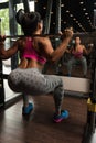 Mexican Woman Doing Exercise Barbell Squat Royalty Free Stock Photo