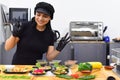 Mexican woman laughing during cooking tacos in the kitchen Royalty Free Stock Photo