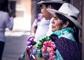 Mexican woman selling handcraft dolls Royalty Free Stock Photo