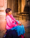 Mexican woman with traditional dress selling handcrafts Royalty Free Stock Photo