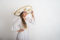 Mexican woman wearing a mariachi hat. Woman with sombrero