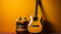 Mexican wooden guitar and flowers near yellow wall. Cinco de Mayo holiday symbol