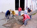 Mexican Workers Pouring Cement