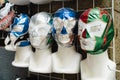 Mexican wrestling masks on mannequin heads