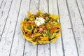 Mexican yellow corn nachos with pico de gallo, chicken tinga, sliced jalapeÃÂ±os, black beans, avocado guacamole, cream cheese and Royalty Free Stock Photo