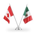 Mexico and Canada table flags isolated on white 3D rendering Royalty Free Stock Photo