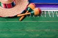 Mexico cinco de mayo wood background mexican sombrero maracas Royalty Free Stock Photo