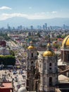 Mexico City, Mexico, Basilica of Our Lady of Guadalupe with Mexico City Skyline on a Sunny Day Royalty Free Stock Photo