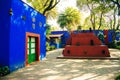 MEXICO CITY, MEXICO - DECEMBER 2019 Colorful courtyard at the Frida Kahlo Museum Royalty Free Stock Photo