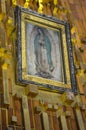 MEXICO CITY, MEXICO - June 19, 2013: Mysterious and miraculous image of Our Lady of Guadalupe, printed in Tilma, in the mantle of
