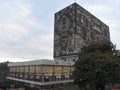Mexico City, Mexico June 2, 2019 UNAM Central Library seen from one side in Philosophy and Letters Faculty with trees around, beau