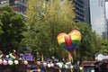 Big heart painted with rainbow flag next to allegorical car in the streak for LGBTTI Pride in Avenida de la reforma protesters oc