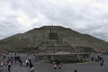 People walking around the ruins at the city of Teotihuacan Pyramids