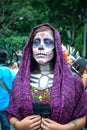 Mexico City, Mexico, ; October 26 2016: Portrait of a woman in disguise at the Day of the Dead parade in Mexico City
