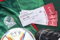 Some generic tickets for the Qatar World Cup on a Mexican Jersey. Concept: World Cup ticket