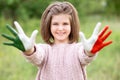 Mexico flag painted on teen girl hands, focus on smile face. Mexican Independence Day. February 5 Day of Conference Royalty Free Stock Photo