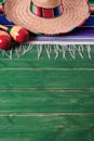 Mexico mexican sombrero maracas fiesta wood background vertical