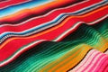 Mexican poncho background blanket cinco de mayo Mexico traditional rug poncho fiesta background with stripes copy space Royalty Free Stock Photo