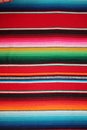 Mexico Mexican traditional cinco de mayo rug poncho fiesta background with stripes Royalty Free Stock Photo