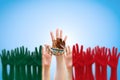 Mexico national flag pattern on people hands raising up for Mexican Independence day celebration and Cinco de Mayo festival