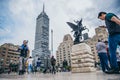 MEXICO - SEPTEMBER 20: Crowd of people at the Palace of Fine arts plaza with the latin american tower in the background