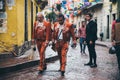 MEXICO - SEPTEMBER 23: Mariachi band members walking in a colorful street, September 23, 2017 in Guanajuato, Mexico.