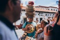 MEXICO - SEPTEMBER 22: Merchant carrying a big pile of hats on t