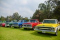 Vintage car show and exhibition of chevrolet pick up and ford cars outdoors.