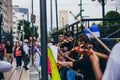 MEXICO - SEPTEMBER 20: young adults playing performing with violins on the street to gather money for the earthquake victims