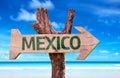 Mexico wooden sign with a beach on background Royalty Free Stock Photo