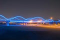 Meydan Bridge and street road or path way on highway with modern architecture buildings in Dubai Downtown at night, urban city at