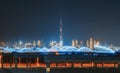 Meydan Bridge and street road or path way on highway with modern architecture buildings in Dubai Downtown skyline at night, urban