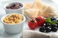 Meze with tomato, olives, and pita bread Royalty Free Stock Photo